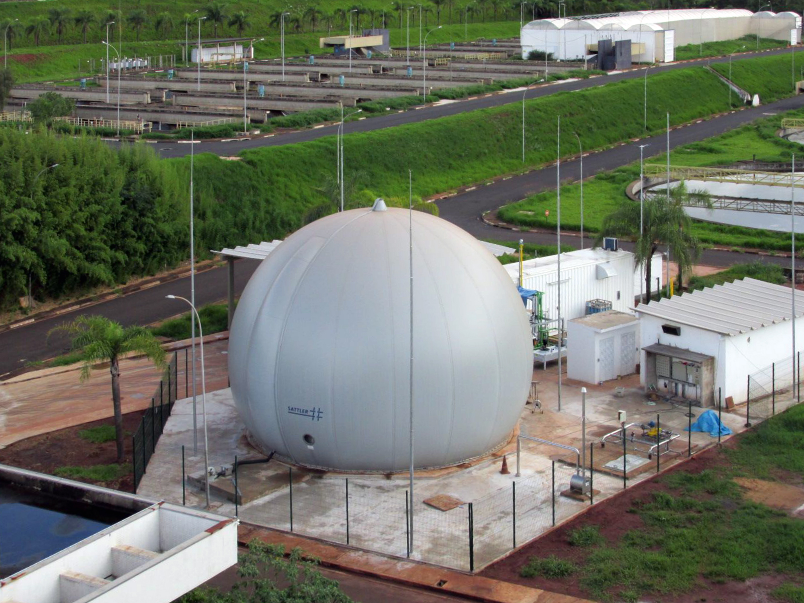 View of the sludge gas upgrading plant in Franca from one of the digester towers.